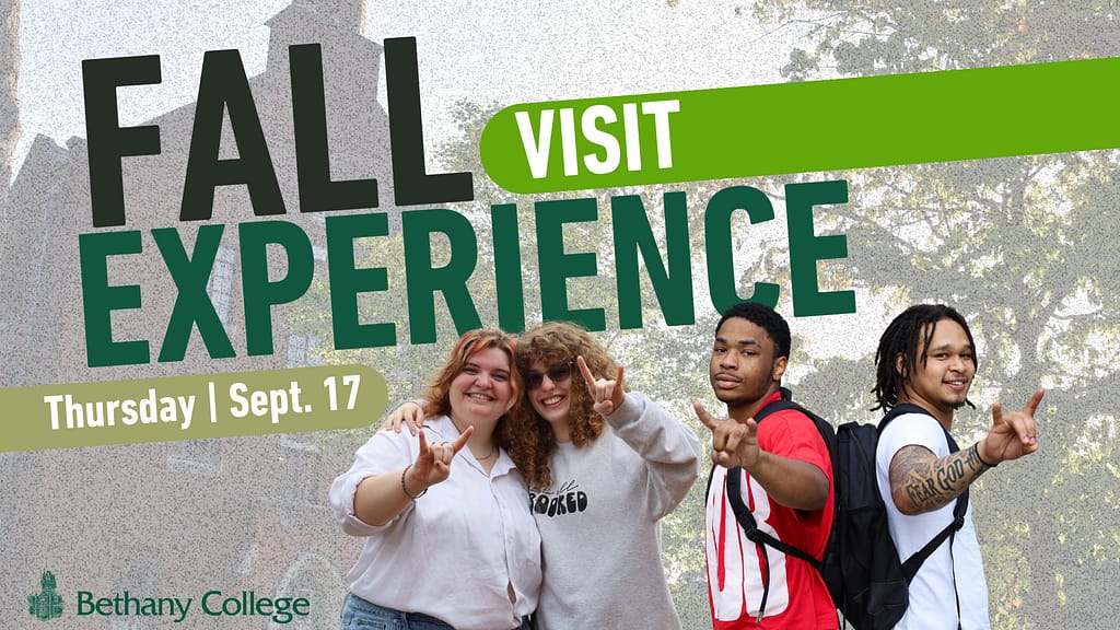 Fall Visit Experience, Thursday, Sept 17. Four students putting up Bison horns.