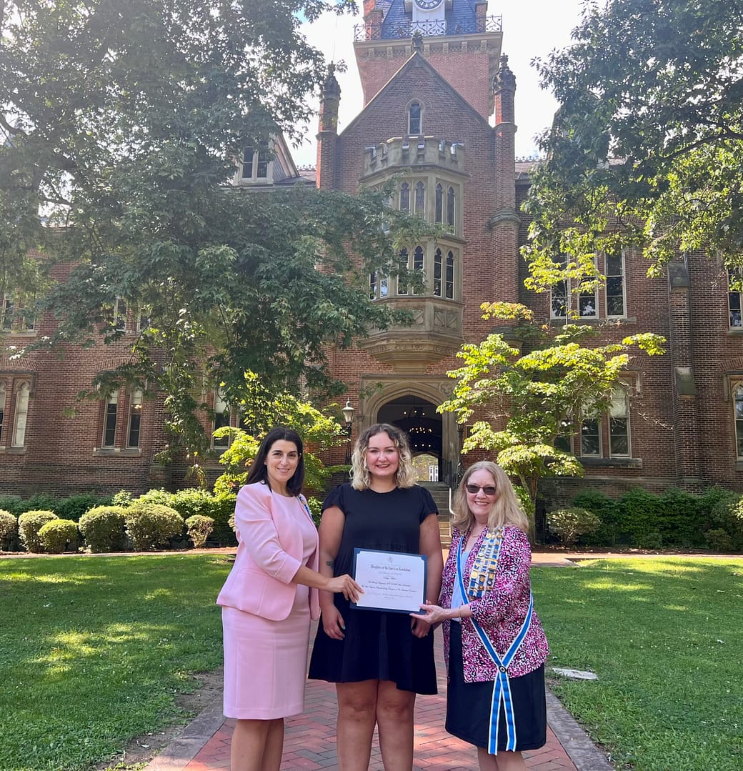 student receiving certificate