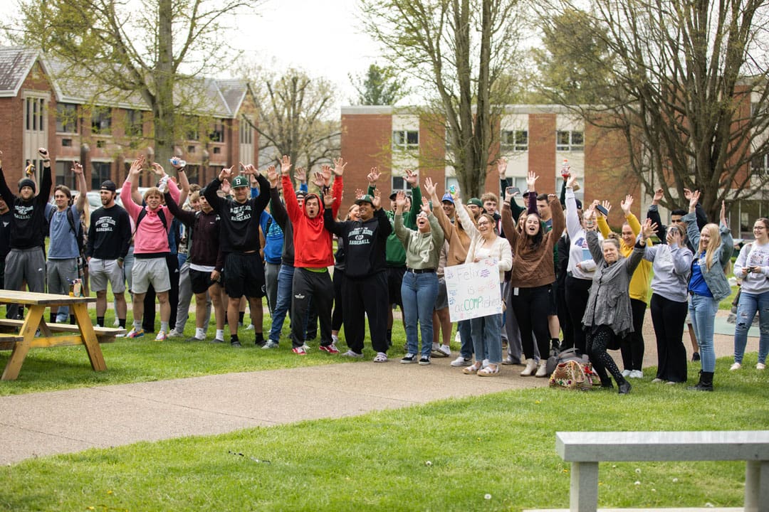 group of people celebrating together outside
