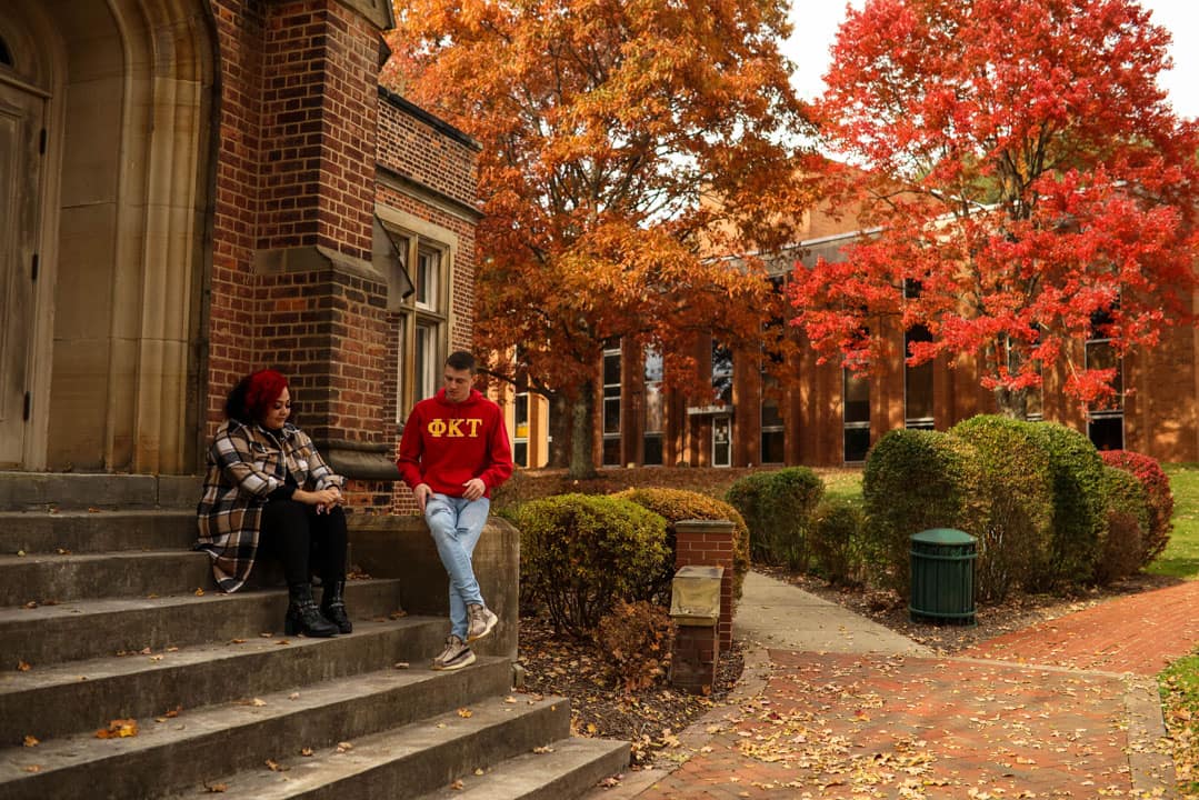 students talking on stairs